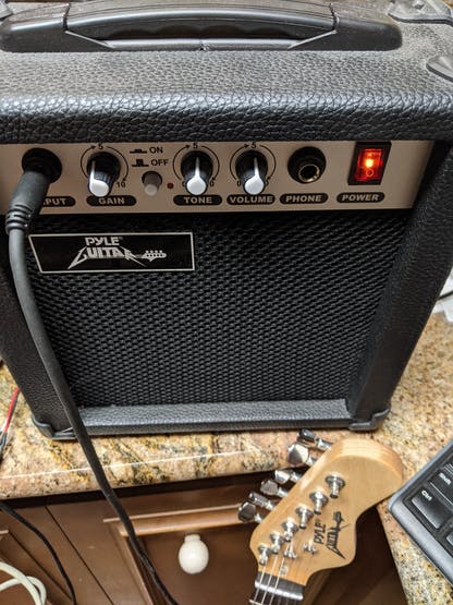 Pyle Amplifier and Pyle Guitar (they both were cheap to purchase)!