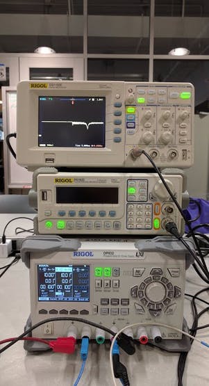 Figure 7b. Bench setup with notch filter output on oscilloscope during frequency sweep