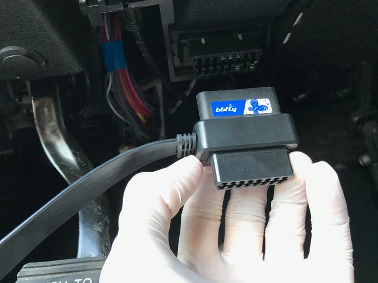 Vehicle OBDII port and ChupaCarBrah OBDII connector