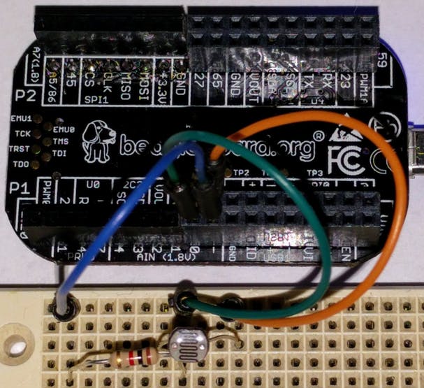 A photocell can be hooked up to the PocketBeagle's analog input to provide a light sensor.