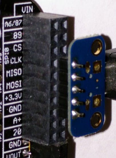 A closeup of how to plug the USB breakout board into the PocketBeagle. It is connected to pins P1_7 through P1_15.