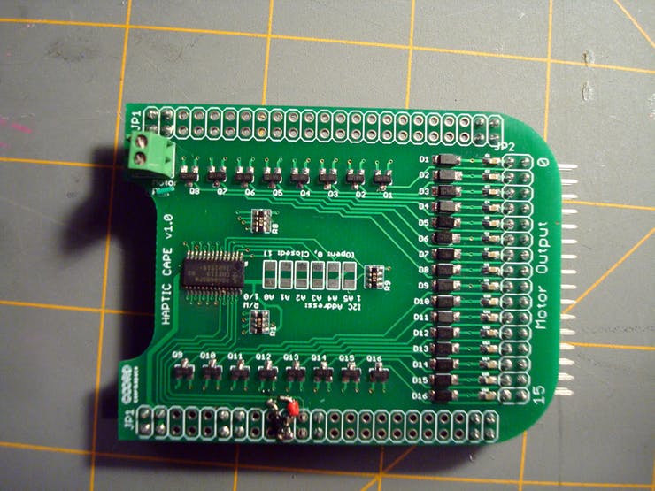 Bonus: Don't let anyone tell you that hardware is easy. For this early revision of the board, I made the mistake of putting the I2C lines on pins that (while shown as I2C2 pins in the docs) were not available for use. Since there wasn't enough time for another round of PCBs before the deadline, I had to do some quick rework. A little trace scraping and some tiny solid core wire later and it was working just fine. Luckily for you, the current version of the Haptic Cape has been updated with this fix along with a few smaller improvements!