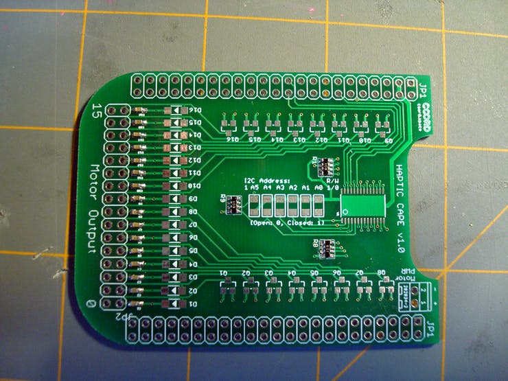 Now go around the part and flow small solder amounts onto each pad. Flux can be really helpful for this to prevent solder bridges. In the end your board should look similar to what's shown here.
